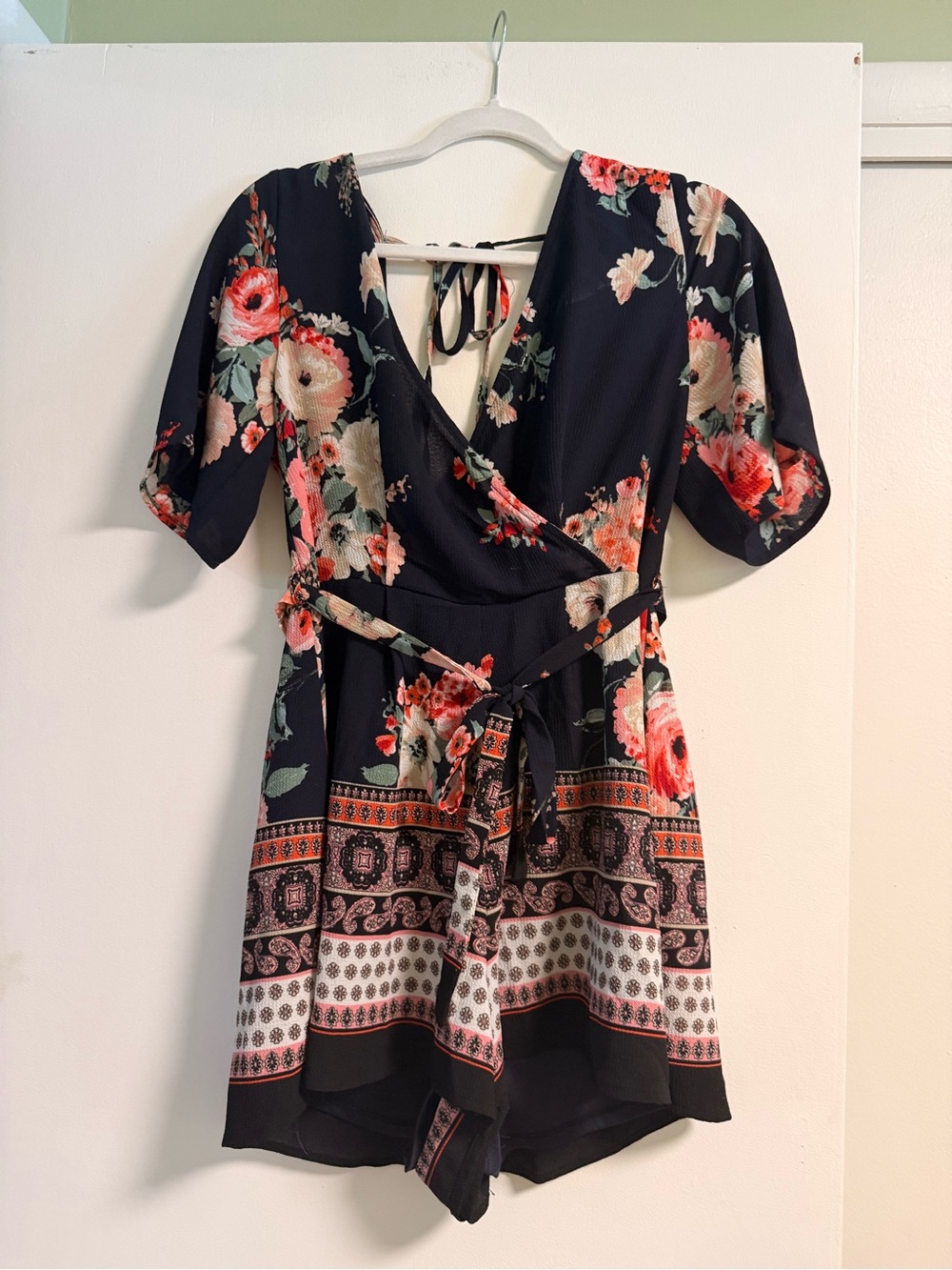 Three Hearts Black Floral Wrap Romper with Coral and Cream Blooms